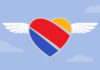 Southwest Airlines logo flying high in the sky! Bypass "Access Denied" and book Southwest flights overseas with a VPN.