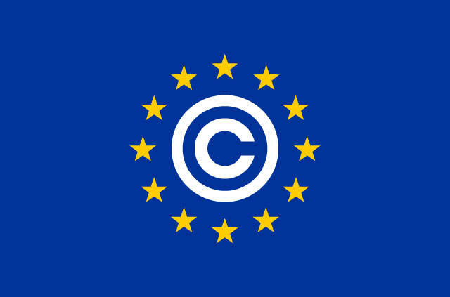 A copyright symbol surrounded by yellow stars on a blue background