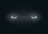 Car headlights appear out of a misty dark. But what's this? They have eyes!!