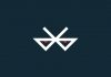 The Bluetooth logo with evil eyes.