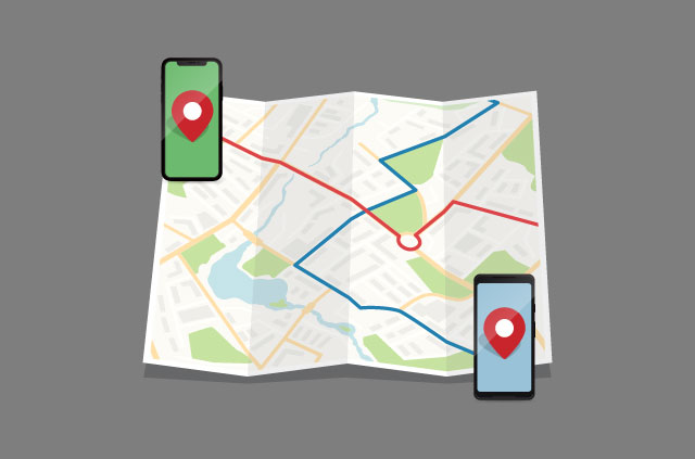 Two phones on a map with lines intersecting from them.
