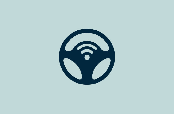 Steering wheel with Wi-Fi symbol.