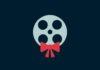 movie reel with a festive bow