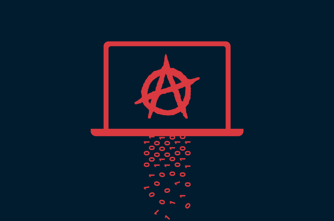 A laptop with an anarchy symbol.