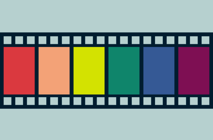 Celluloid film reel with rainbow colors.