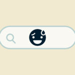 Embarrassed emoji in a search bar.